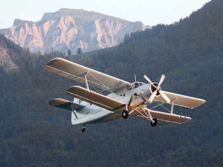 Flying biplane.