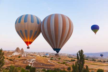 Hot air balloon flying over Cappadocia Turkey