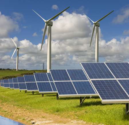 Wind turbines and solar panels. Cornwall in the UK.