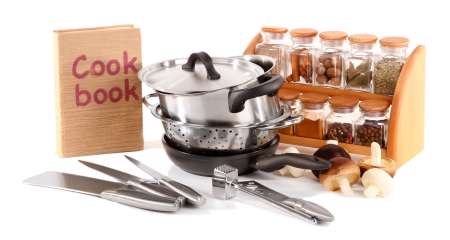 composition of kitchen tools,spices and vegetables isolated