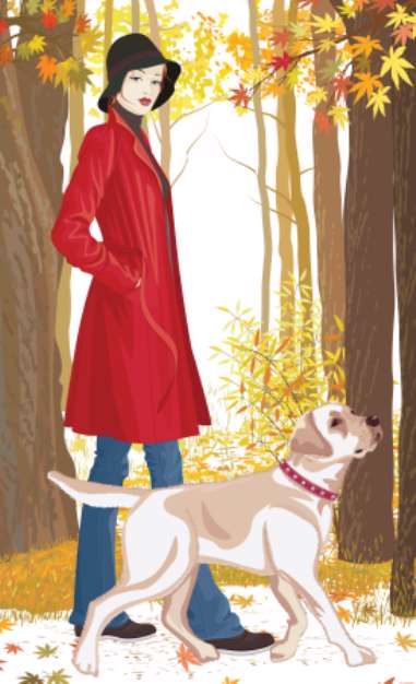 Woman with a dog walking in the park