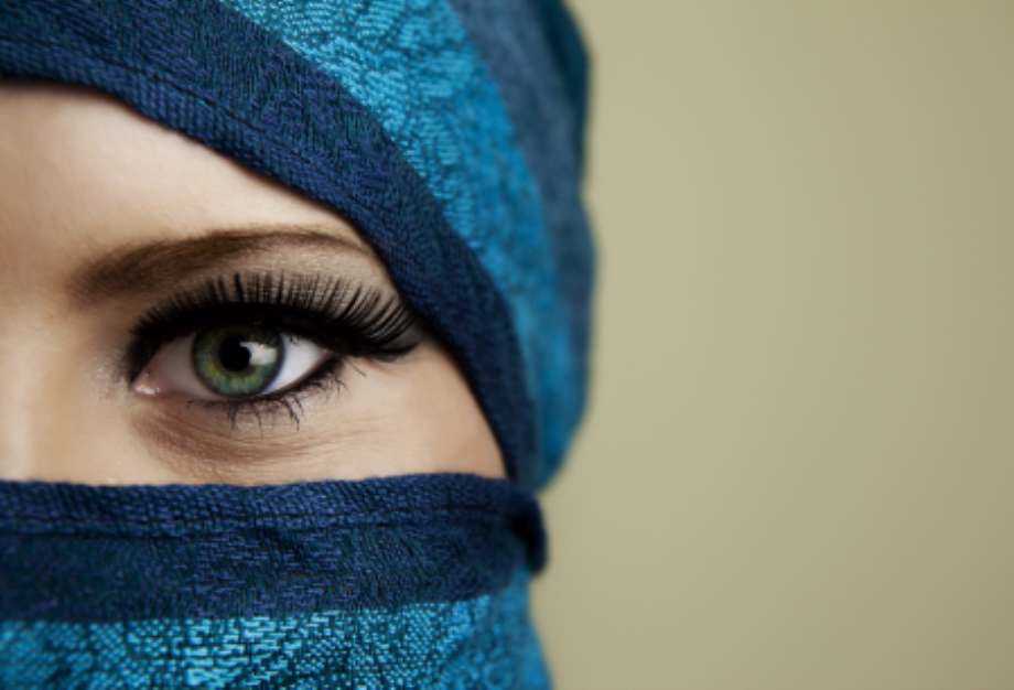 Young arabian woman in hijab with sexy blue eyes
