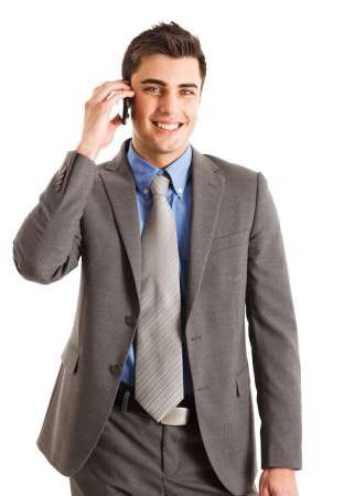 Businessman talking on the phone. Isolated on white