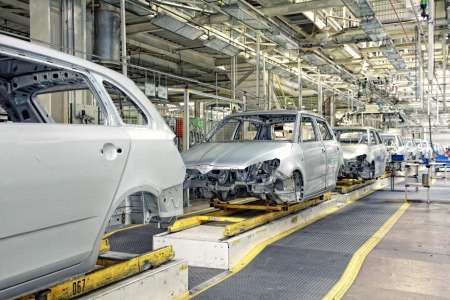 cars in a row at car plant