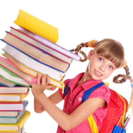 Child with pile of books.