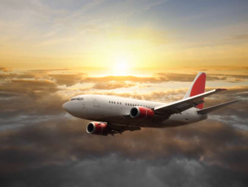 Big aircraft at sunset