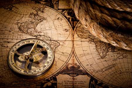 old compass and rope on vintage map 1752