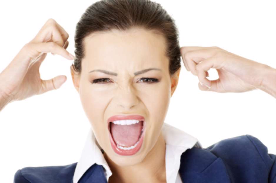 Stressed or angry businesswoman screaming loud