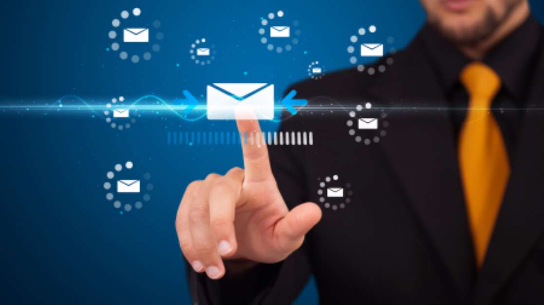 Businessman pressing virtual messaging type of icons
