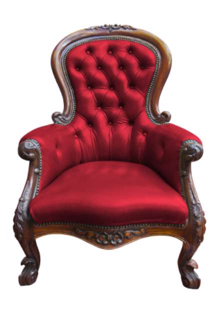 vintage red leather armchair on white with clipping path