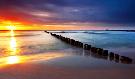 Baltic sea at beautiful sunrise in Poland beach.