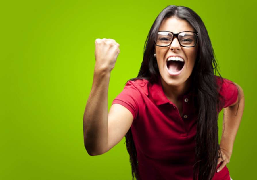 woman gesturing victory