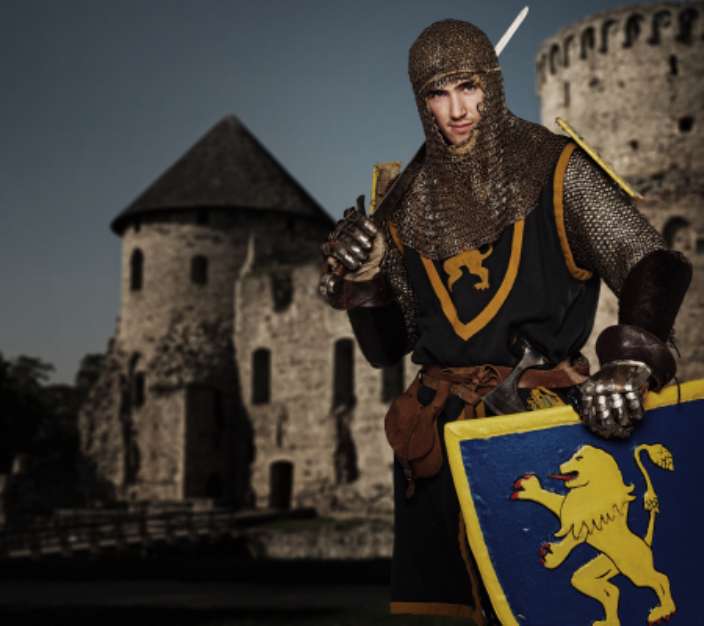 Knight against medieval castle.
