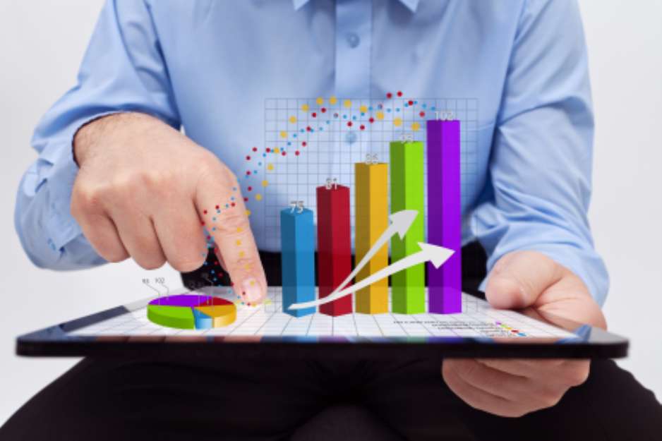 Businessman working on annual report - closeup on charts