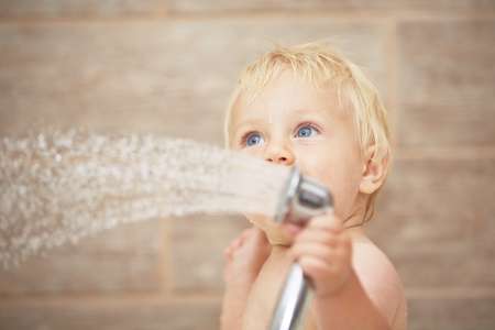Blond baby in the bathroom