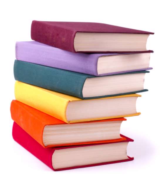 Old colorful books isolated on white background