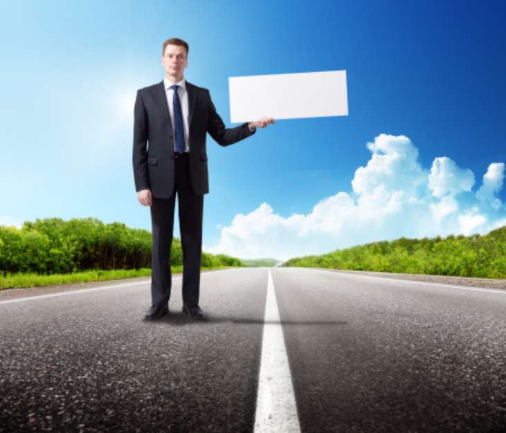 business man on the road whith blank in hand