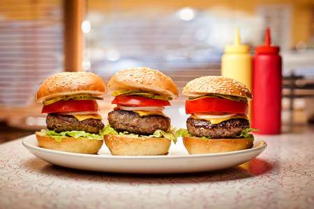 Fresh hamburger with french fries.