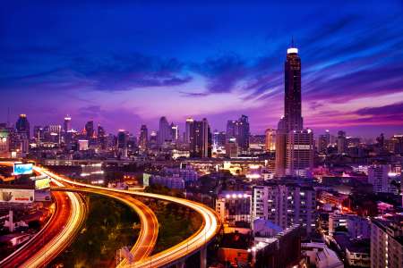 Traffic in modern city at night, Bangkok Thailand