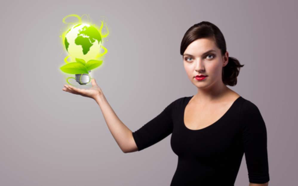 woman holding virtual eco sign