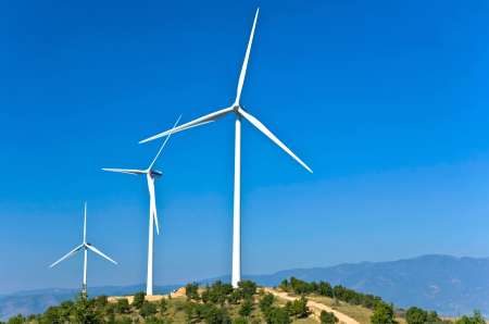 Electric power wind generators stationed on a hill