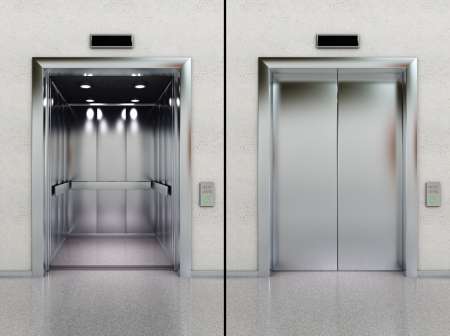Open and closed elevator in lobby