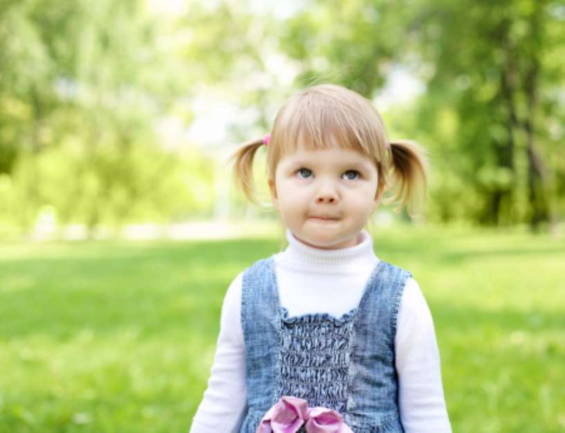Portrait of a little girl outdoors
