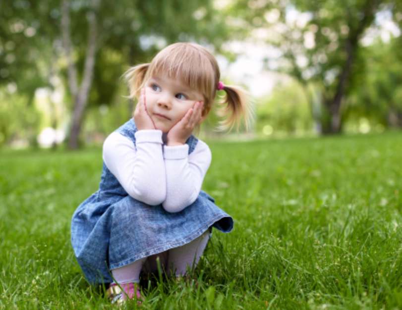 Portrait of a little girl outdoors