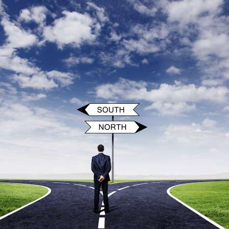 Businessman at crossroads