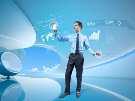 Young businessman navigating holographic virtual interface