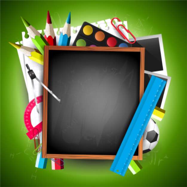 School blackboard with school supplies and copyspace