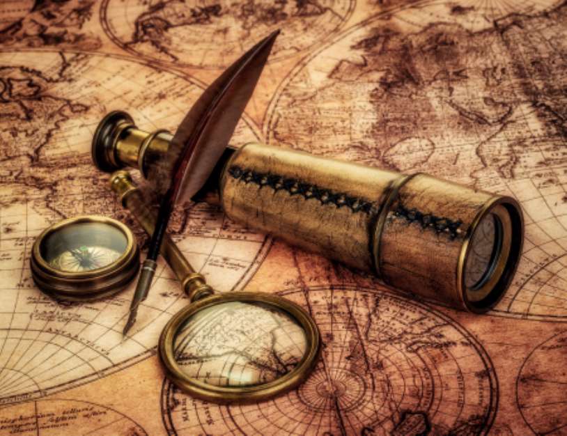 Vintage items on ancient map.