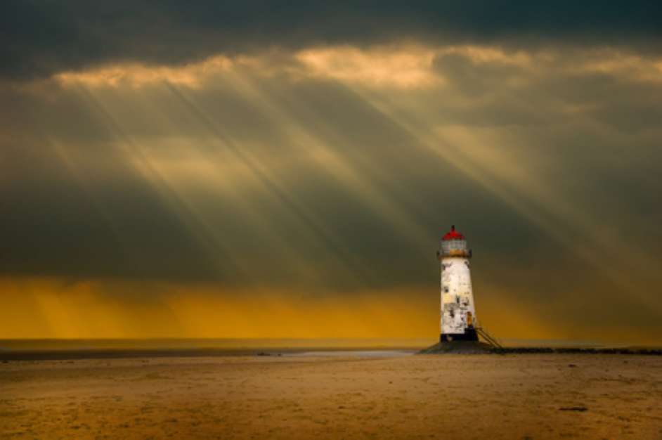lighthouse as the storm breaks