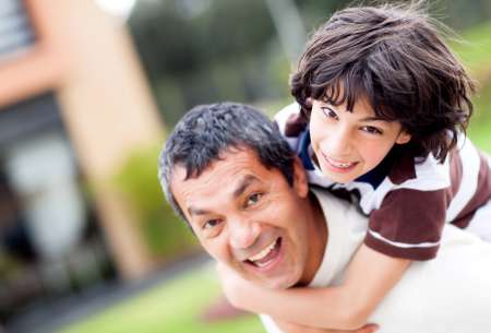 Father and son playing