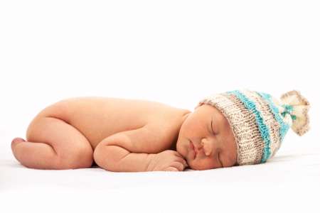 Newborn baby boy asleep