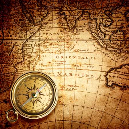old compass and rope on vintage map 1732