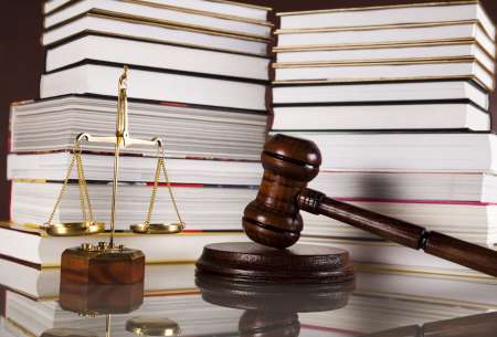 Judges wooden gavel and law books 