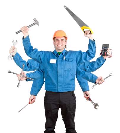 Smiling worker with tools in many hands