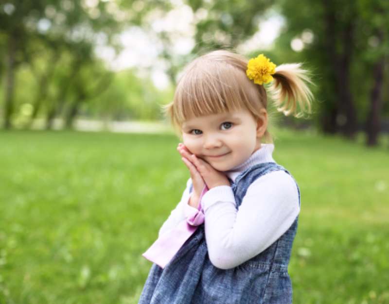 Portrait of a little girl outdoors