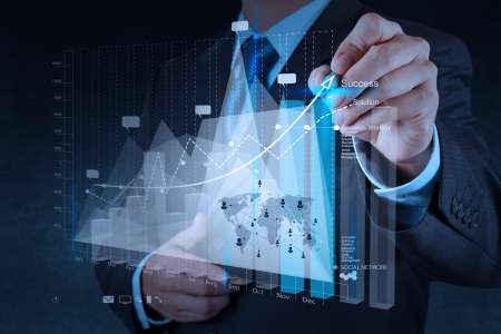 businessman hand working with new modern computer and business s