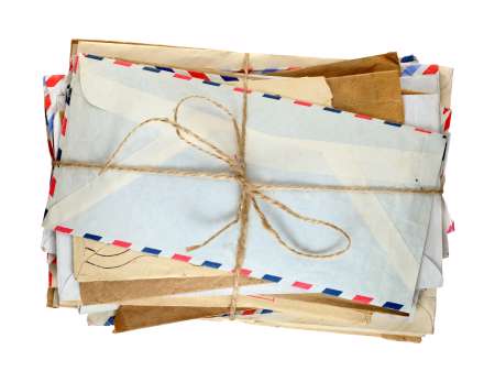 Pile of old envelopes isolated on white background
