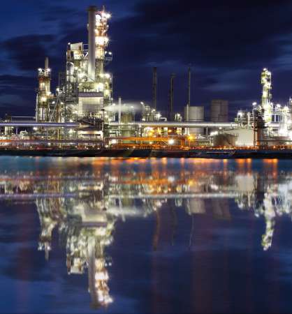 Oil refinery industrial plant at night