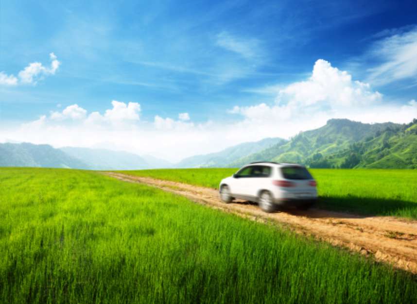 ground road and blurred car