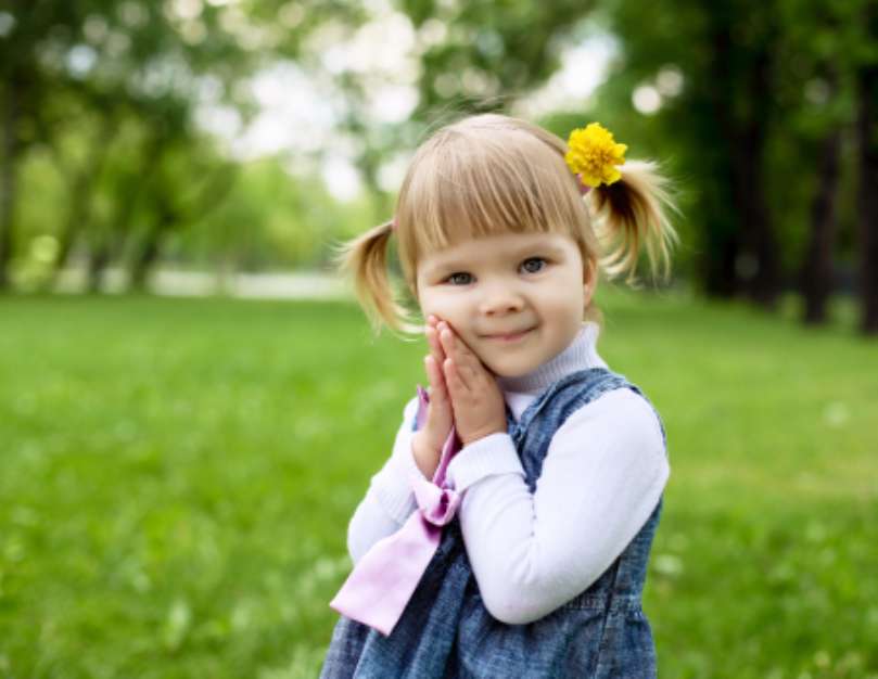 Portrait of a little girl outdoors
