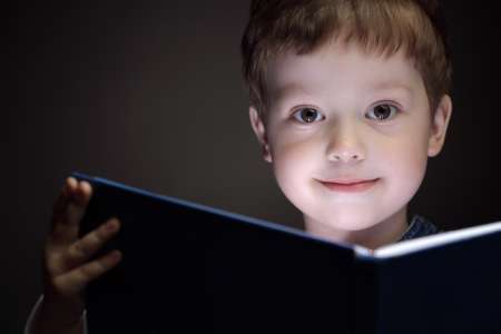 little boy read book