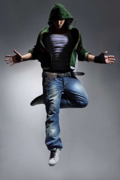 cool looking dancer makes a difficult jump