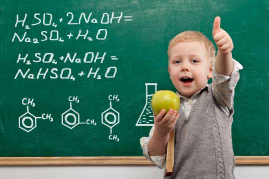 Cheerful smiling  child with a book. School concept