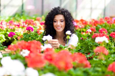 Woman in a greenhouse