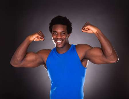 African Man Showing Muscle