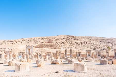 Part of the Hall of a Hundred Columns with the Tomb of King Artaxerxes III in the background at Pe